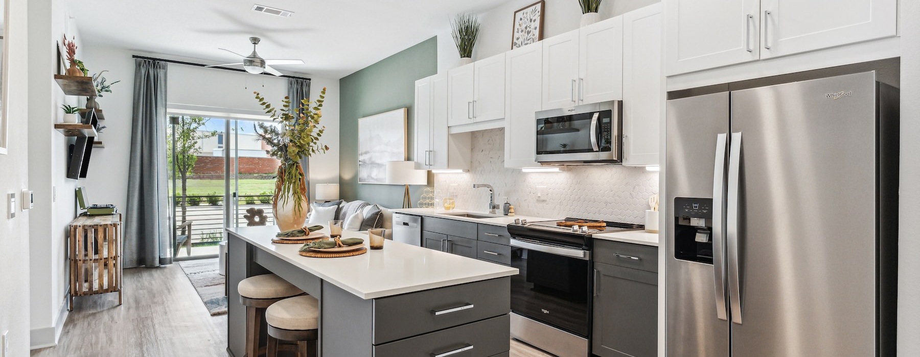 a kitchen with white cabinets